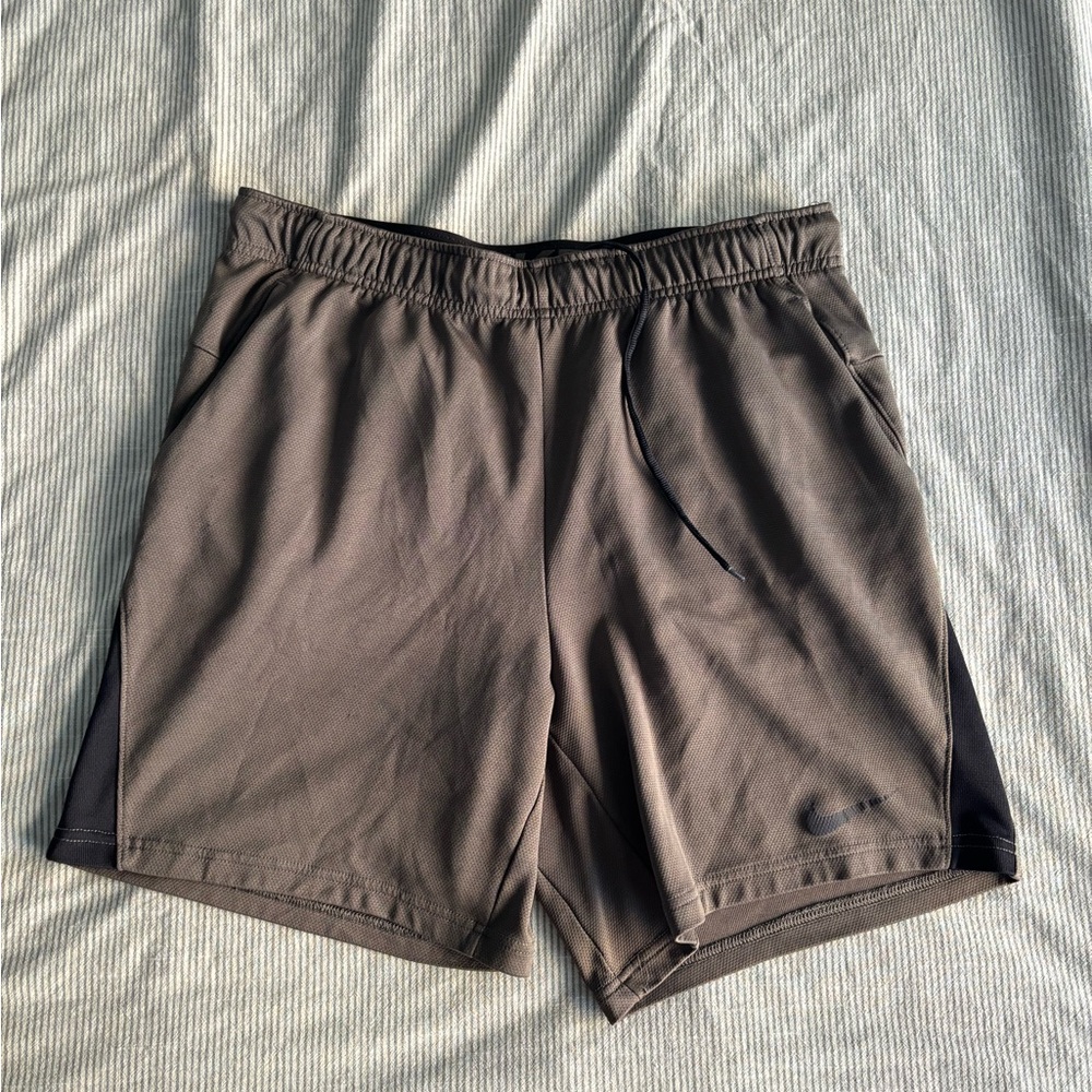 Olive green Nike dri-fit athletic shorts. Men’s size Large.